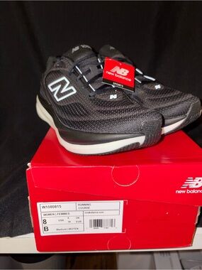 New Balance Women Black and White Mesh Sneakers